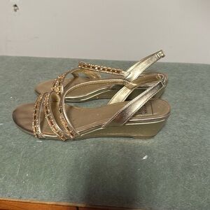 New York transit dress sandal in a bronze gold color size 6.5 m.